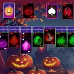 オレンジ色のジャックオランタンとカラフルなトランプカードが並ぶハロウィーンの背景。