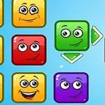 色とりどりの顔が描かれたブロックが並んでおり、緑のブロックが矢印で示されている。