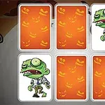 5枚のカードのうち2枚が緑色のコミカルなゾンビの絵で、他の3枚はオレンジ色のパンプキンデザインのカード。