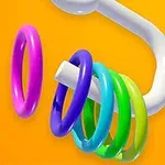 白いフックにカラフルなリングが掛かっている画像。