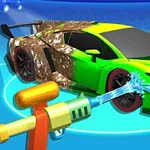 緑と黄色のスポーツカーが水鉄砲で泥を洗い落としている様子。