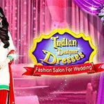 インドの伝統的な服を着た女性と「Indian Designer Dresses」のテキストがピンクの背景に描かれている。