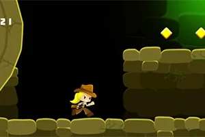 石の洞窟の中で、帽子をかぶった黄色い髪のキャラクターが右に走っている。