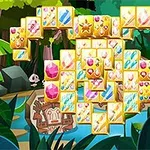 ジャングルの背景に、色とりどりの宝石が描かれたタイルが積み重なっている。