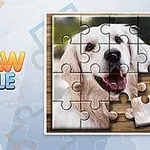 ジグソーパズルの一部が完成した犬の写真。