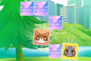 公園の背景に猫の表情が描かれたカードが配置された場面。