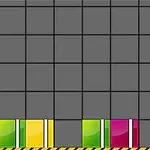 グリッド上に赤、黄、緑、ピンクのブロックが配置されている画像。