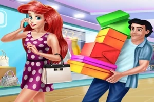 女性がショッピングを楽しんでいる様子で、男性がたくさんのギフトボックスを運んでいる。