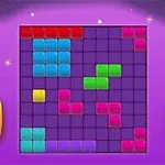 紫の背景にカラフルなブロックが並んだパズルゲームのスクリーンショット。