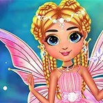 ピンクの妖精の羽を持った金髪の少女が微笑んでいるイラスト。