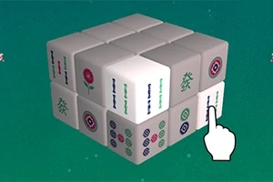 緑の背景に3×3の白い立方体ブロックが積み重ねられた画像で、ブロックには麻雀のような模様が描かれており、手のアイコンがそのうちの一つを指している。