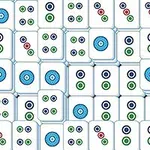 白いタイルに青、緑、赤の円形模様が描かれている画像。