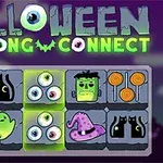 ハロウィンテーマのキャラクターとアイテムが描かれたマージャンパズルの画面。