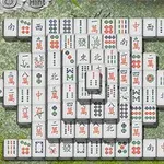 緑の背景にマージャン牌が整然と並べられている画像。