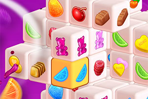 色とりどりのフルーツやお菓子の絵が描かれた立方体が積み重なっている。