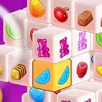 色とりどりのフルーツやお菓子の絵が描かれた立方体が積み重なっている。