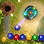 色とりどりのボールが並んでいて、中央にはボールを発射するカエルの像が置かれている。