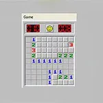 灰色の背景に、数字が書かれた9×9のグリッドと笑顔のアイコンが並んでいる。