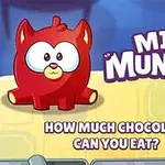 赤いキャラクターが描かれた背景に「MINI MUNCHER」と書かれているデザイン。