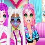 3人のキャラクターがカラフルなユニコーンコスチュームを着て、虹色の背景の前に立っている。