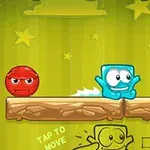 緑の背景に星が描かれた木製の足場の上に、青いキャラクターと赤い球状のキャラクターが並んでいる。