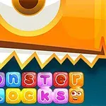 オレンジ色のモンスターの目とギザギザの歯の下に「monster blocks」とカラフルに書かれたブロックの文字。