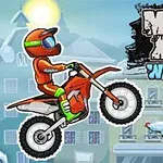 オレンジ色のライダーがオフロードバイクに乗って雪景色の中にいる様子とクリスマスツリーが描かれたイラスト。