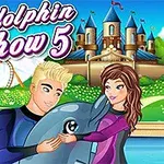 2人のキャラクターがイルカと親しく触れ合う様子、背景に遊園地と城が描かれているイラスト。