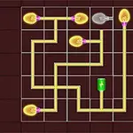 電球のイラストが配線された迷路の上に配置されている画像。