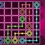 ピンクの背景に色付きの点と線で構成されたパズルボード。