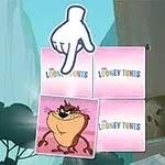 指さす手のイラストがある背景に、タスマニアン・デビルのキャラクター画像と「Looney Tunes」ロゴのカードが配置されている。