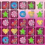 カラフルな数字と記号が並んだスクリーンショットで、背景はピンク色。