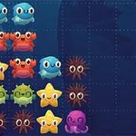 カラフルな海洋生物のイラストがグリッド上に配置されている。