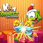 緑色のキャラクターがクリスマス帽をかぶっており、背景にはたくさんのプレゼントボックスが並んでいて、中央に輝くギフトボックスがあります。