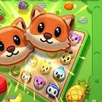 2匹のかわいいキツネのキャラクターとカラフルなフルーツや動物のイラストが描かれたゲームボード。
