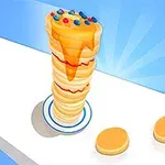 青い背景に高く積まれたパンケーキの塔があり、上にはシロップとカラフルなトッピングがかかっている。