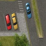 駐車場で複数の車が駐車および運転されている上空からの風景。