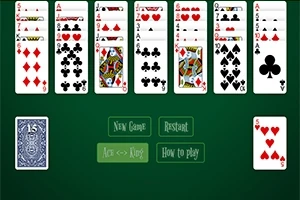 トランプが並べられたソリティア風の緑の背景のゲーム画面。