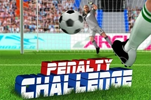 サッカーのゴール前でボールを蹴る選手とゴールキーパーが構えるシーン。