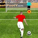 赤いシャツを着たサッカー選手がゴールキーパーに向かってペナルティキックをしようとしている場面。