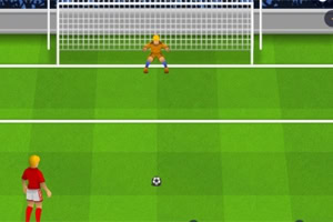 サッカーのピッチで赤いユニフォームの選手がペナルティキックを準備し、ゴールにゴールキーパーが構えている。