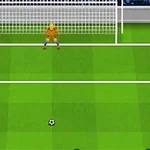 サッカーのピッチで赤いユニフォームの選手がペナルティキックを準備し、ゴールにゴールキーパーが構えている。