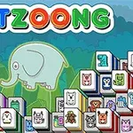カラフルな文字とイラスト付きのタイルが並ぶ背景に、中央に淡い色の象のイラストが描かれている画像。