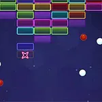 カラフルな長方形ブロックと多数の赤と白のボールが浮かぶ、暗い背景。
