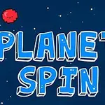 青い背景に白い星が散りばめられ、中央に大きく「PLANET SPIN」の文字と赤と緑の笑顔の惑星が描かれている。
