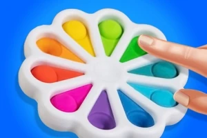 カラフルな花型のポップイットおもちゃを指で押している様子。