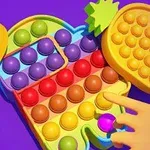 カラフルなポップイットのおもちゃを指で押している場面。