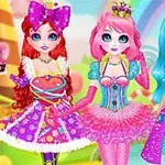 色とりどりの衣装を着た3人のキャラクターが背景の虹の前に立っている。