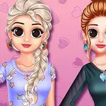 ピンクの背景にハート模様があり、カジュアルな服装をした二人の若い女性が並んで立っている。