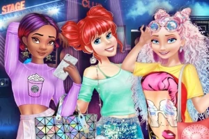 色鮮やかな服を着た3人の女性が笑顔でパーティーに参加している様子。